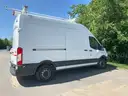 2015 Ford Transit 250 Van High Roof Equipped with ladder rack, conduit carrier, drawers and cabinets