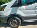 2015 Ford Transit 250 Van High Roof Equipped with ladder rack, conduit carrier, drawers and cabinets