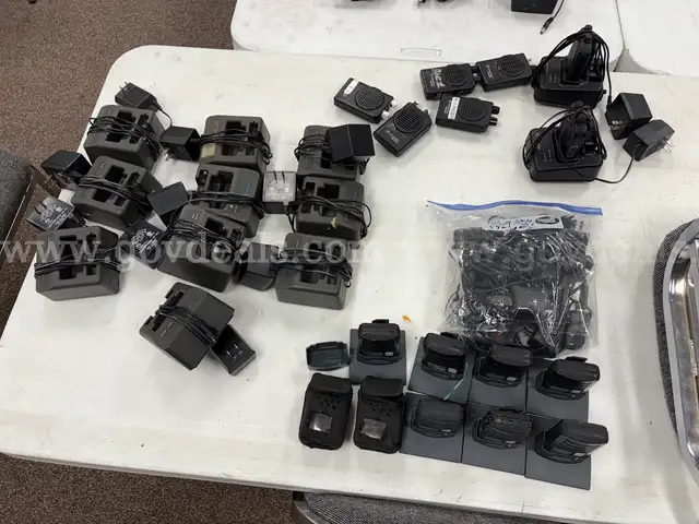 Lot of Motorola and Swiss phone pagers with accessories