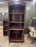 Executive Bookcase, Conference Table with Chairs and a Oversized Leather Chair