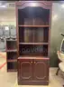 Executive Bookcase, Conference Table with Chairs and a Oversized Leather Chair