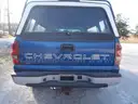 2003 Chevy Silverado 4x4 1500 4.8L Vortec V8, standard cab long bed w/camper shell