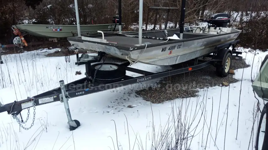 Boat motor trailer