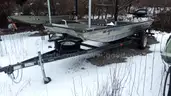 Boat motor trailer