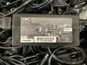 100 HP 65-Watt AC Adapters, 35 HP UltraSlim Docking Stations, CISCO Meraki Power Supply Cords, and Other Cables