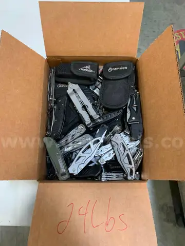 Box of Gerber Knives and Multi Tools