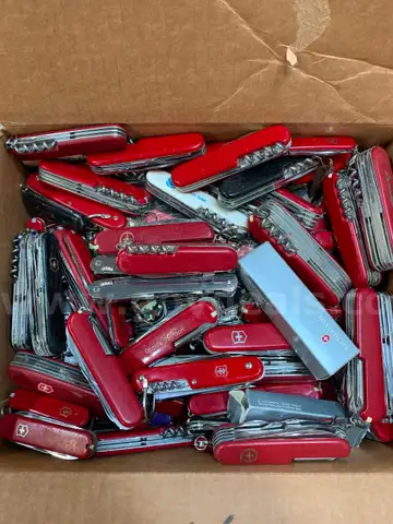 Box of Swiss Army Knives
