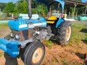 TAG #PWS-000462 1999 HOLLAND TRACTOR #462
