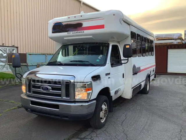 2016 Ford E450 14 Passenger Paratransit Van with wheelchair lift.