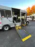 2017 Ford E450 14 Passenger Paratransit Van with wheelchair lift.