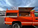 2005 Chevy 2500HD Duramax 4X4 pickup truck with work box.