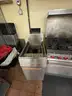 Lot of commercial kitchen equipment
