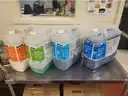 Lot of Various EcoLab Chemicals and Cleaning Supplies