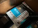 Lot of Modems, Garmin GPS items, Various Cameras, and Projectors