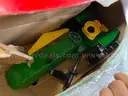 Lot of JD Traveling Tractor Sprinkler, Air Compressors, Seed Spreader, and Other Tools