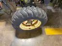 John Deere Tractor with Broom &#x26; Spreader Attachments