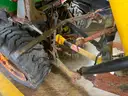 John Deere Tractor with Broom &#x26; Spreader Attachments