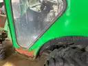 John Deere Tractor with Broom &#x26; Spreader Attachments