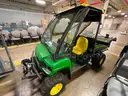 John Deere 4x4 Gator with Cab and Snow Blade