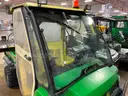 John Deere 4x4 Gator with Cab and Snow Blade