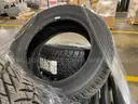 Pallet of (4) Goodyear P235/55/R17 Tires and Metal/Steel Vehicle Partitions