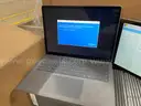Lot of Microsoft Surface Pros and Dell Desktop PCs