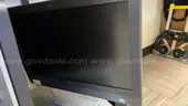 Lot of various computer equipment, tablets, monitors, and electronics.
