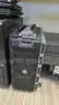 Lot of various computer equipment, tablets, monitors, and electronics.