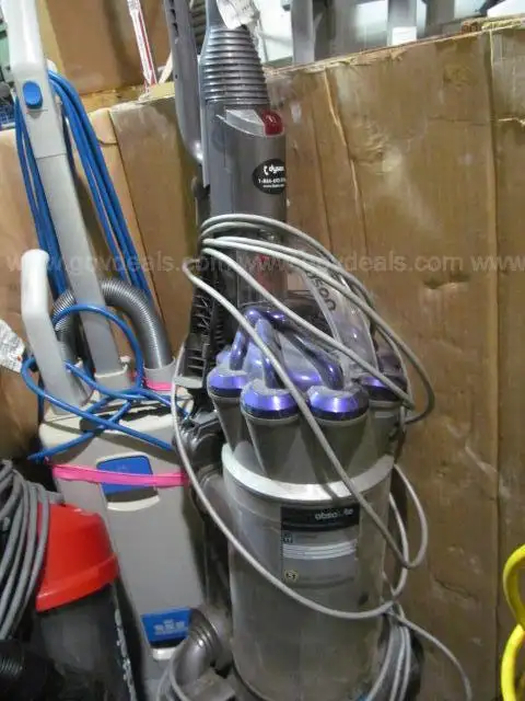 Large Lot of Used Upright Vacuum Cleaners , Brands like Shark , Dyson, Hoover ETC.