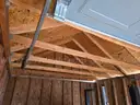 Approximate 15&#x27; 10&#x22; x 11&#x27; 9&#x22; building with garage door