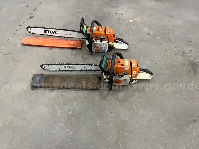2 Stihl chain saws