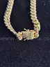 24&#x201D; Cuban link 14K gold necklace with double box lock clasp. Weight: 39.3 grams.