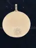 14K gold medallion with diamonds. Weight: 77.6 grams