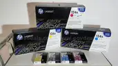 Lot of Three (3) HP Toners (124A) with Four (4) Epson Inkjet Cartridges (822XL)