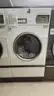 Lot of Commercial Laundry Equipment: Three (3) Washers, Three (3) Dryers with Chemical Pumps