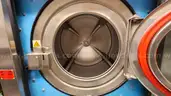 Lot of Commercial Laundry Equipment: Three (3) Washers, Three (3) Dryers with Chemical Pumps