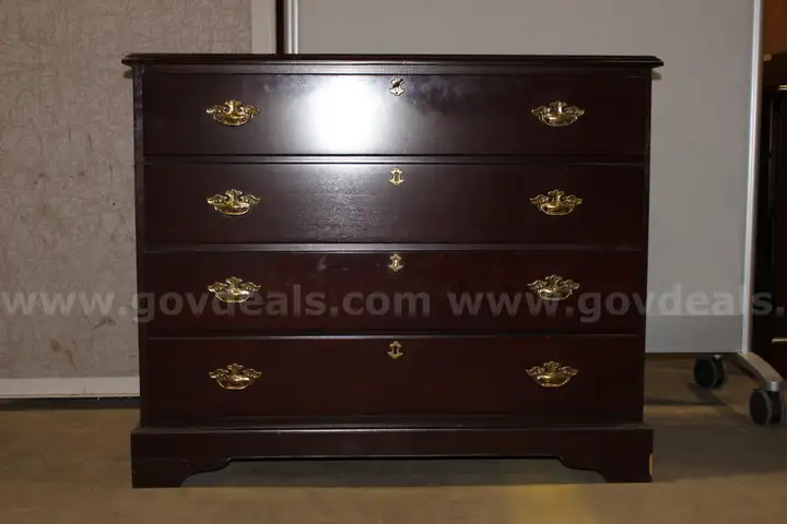 (1) Dark Wooden Four-Drawer Chest