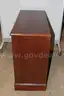 (1) Wooden 4-Drawer Dresser &#x2013; Brass Handles, Classic Finish