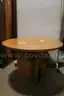 (1) Round Wooden Table &#x2013; Compact design, wood laminate finish