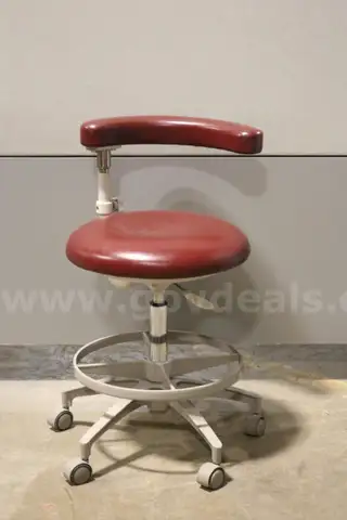 (1) A-dec Burgundy Dental Stool &#x2013; Adjustable Armrest, Rolling Base