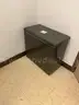 Metal cabinet, maybe for photo storage originally?