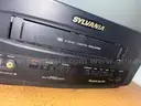 Sylvania TV/VCR, turns on
