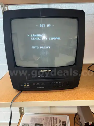 Sylvania TV/VCR, turns on