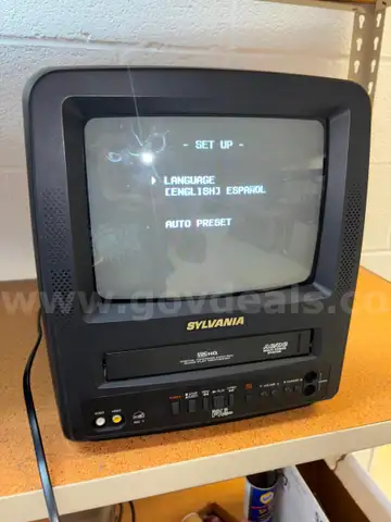 Sylvania TV/VCR, turns on