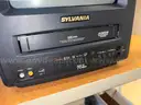 Sylvania TV/VCR, turns on
