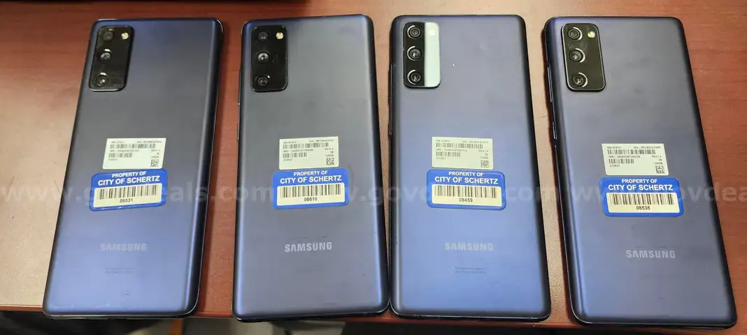 Four (4) Cell Phones - No power cords (WILL NOT SHIP)