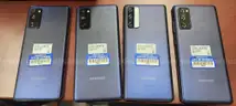 Four (4) Cell Phones - No power cords (WILL NOT SHIP)