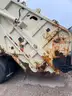 2001 Crane Carrier Co. Rear Loading Garbage Truck