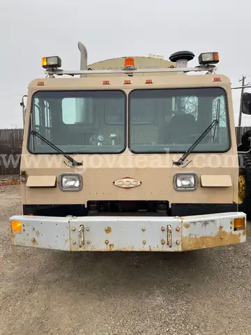 2001 Crane Carrier Co. Rear Loading Garbage Truck