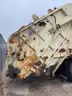 2001 Crane Carrier Co. Rear Loading Garbage Truck